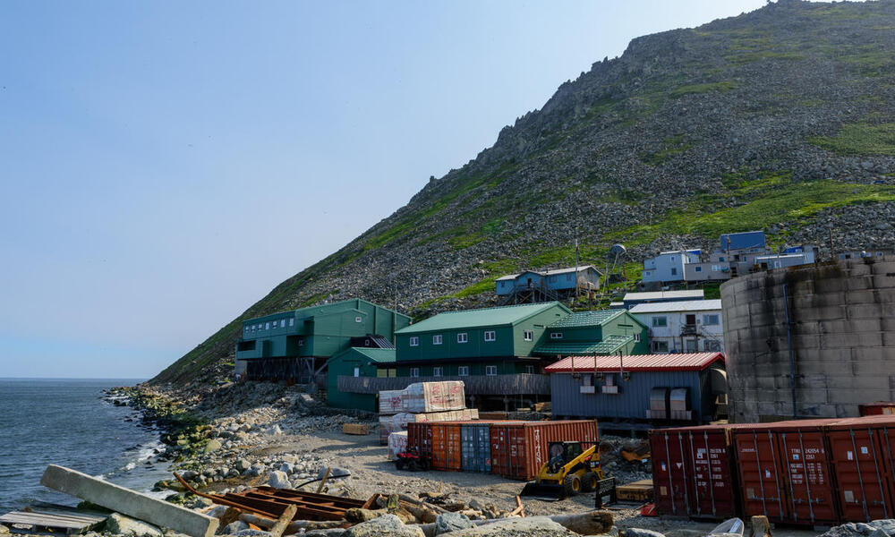 Little Diomede village, facing North, with Little Diomede Island in the background.